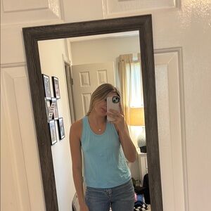 Blue sleeveless tank top with scoop neck